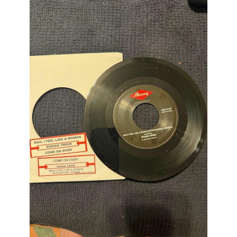 Shania Twain - man! I feel like a woman/come on over 45 rpm vinyl records